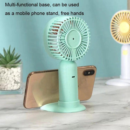 Handheld Portable Fan for Everyday Cooling and Travel Use showing mint fan with multifunctional base doubling as phone stand