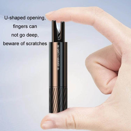 Emergency Safety Hammer for Car Window Escape and Breaking compact metal tool with U-shaped opening shown between fingers