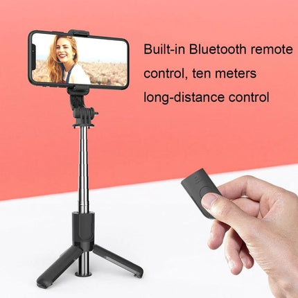 CYKE Tripod for Everyday Phone Photos and Videos showing phone mounted on small tripod with built-in Bluetooth remote in hand