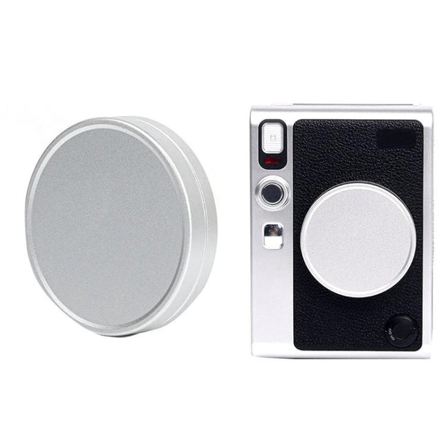 FUJIFILM Instax Mini EVO Aluminum Alloy Lens Cap silver protective cover shown beside Instax Mini EVO camera