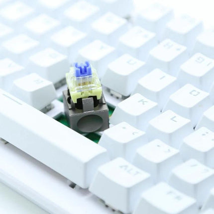 Metal Switch Opener for Mechanical Keyboards with Cherry and Gateron Compatibility on white keyboard showing removed switch for easy maintenance