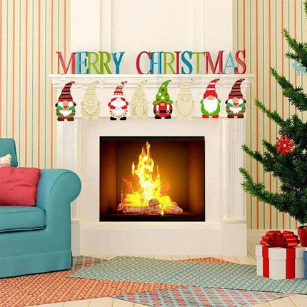 Christmas Tree DIY Painting Wooden Dwarf Elf Ornaments Set Of 32 displayed painted on mantel above a lit fireplace for holiday decor