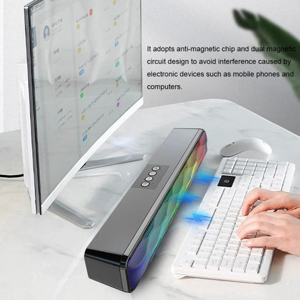 Compact Bluetooth Home Speaker For Everyday Listening on a desk with keyboard, monitor and RGB sound effects, clear home audio