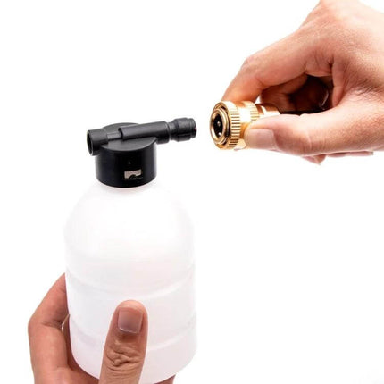 HILDA Cordless High Pressure Water Torch For Car Cleaning - hand attaching brass connector to foam bottle, cordless car wash accessory