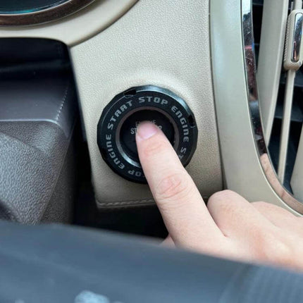 Start Button Protective Cover With Rotating Cap For Everyday Use shown installed protecting car engine start button from scratches and accidental presses
