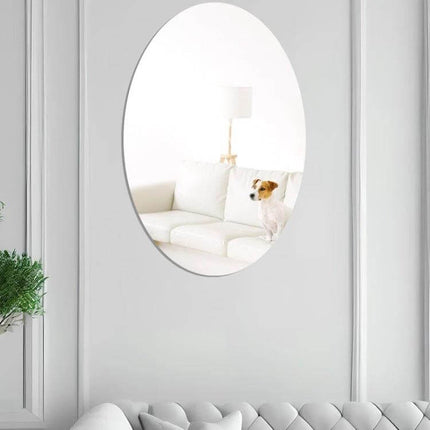 Oval Acrylic Mirror Wall Sticker For Living Room Decor 15x10cm reflecting bright sofa and small dog in a hallway to enhance light and space