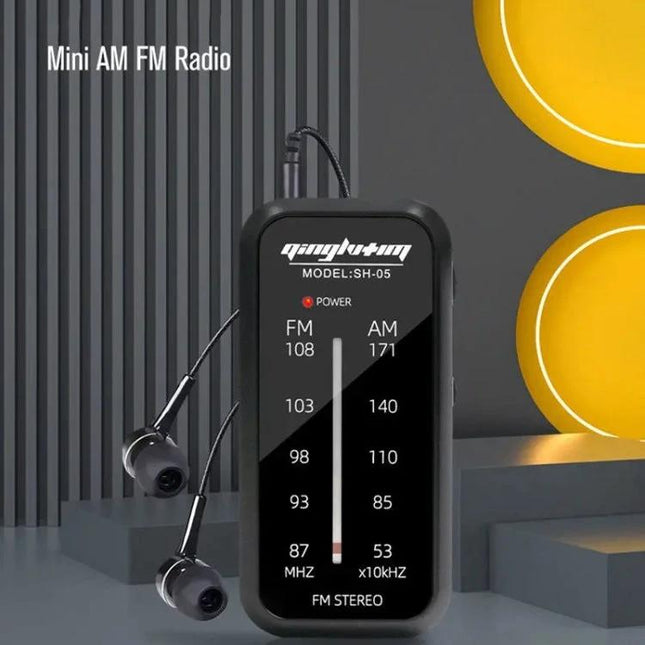 Compact FM/AM Radio for On-the-Go Listening with Clip black mini radio with earbuds and metal back clip attached