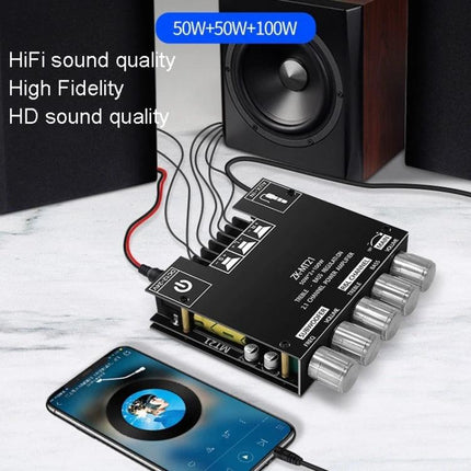 ZK-MT21 Bluetooth Amplifier for Home Audio Systems compact Bluetooth 5.0 amp beside speakers and smartphone on a table