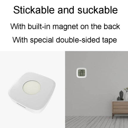 Mini Electronic Pet Temperature And Humidity Meter For Home Use compact stickable, magnet-backed white monitor showing temp and humidity on wall
