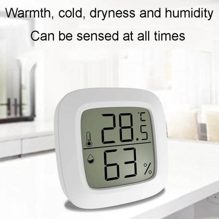 Mini Electronic Pet Temperature And Humidity Meter For Home Use white compact digital indoor thermometer hygrometer showing 28.5°C and 63%