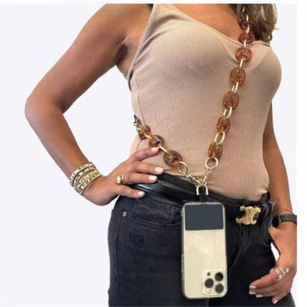 Retro Tortoiseshell Acrylic Phone Lanyard for Hands-Free Use shown worn crossbody with acrylic tortoiseshell chain and phone case
