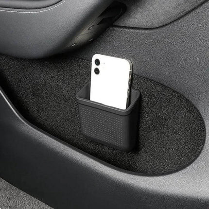 Silicone Car Storage Tray With Adhesive Back For Organizing Small Items - black silicone car pocket holding a phone in Tesla Model 3/Y