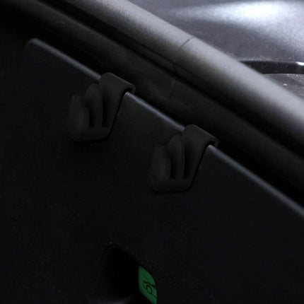 Front Trunk Storage Hook For Tesla Model Y Keeps Trunk Organized - ABS snap-on hooks securing grocery bags and cables in front trunk