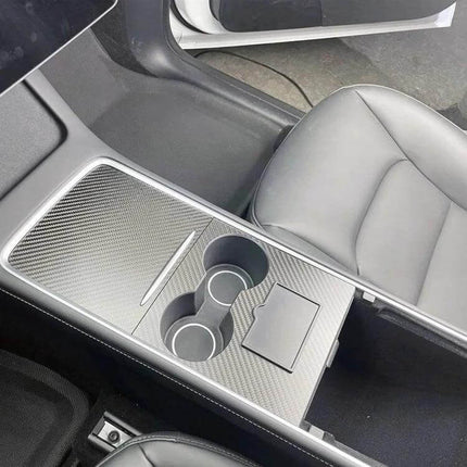 Tesla Center Panel Protection Film Matte Carbon Fiber fitted over Model 3/Y center console with cupholders and matte carbon finish