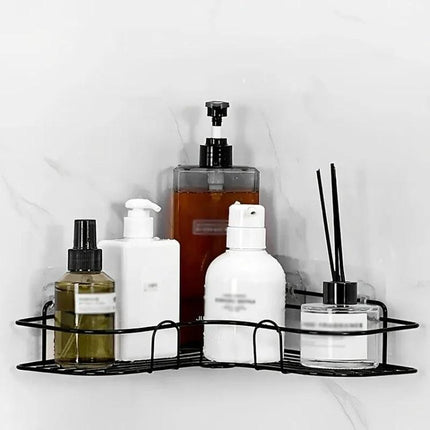 Organize Bathroom Essentials with a Wall-Mounted Triangle Rack holding bottles and toiletries to free counter space in small bathrooms