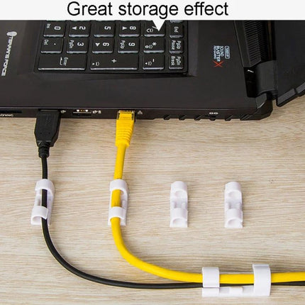 Set of 20 Adhesive Cable Clips for Home Wire Organization securing black and yellow cables along laptop and desk