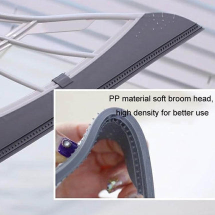Magic Broom Soft Silicone Scraper Bathroom Wiper For Daily Cleanup - close-up of grey PP soft broom head flexing to remove water and stains