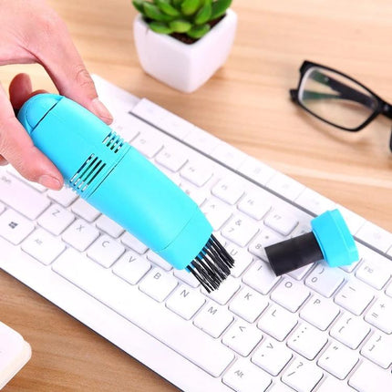 Portable USB-Powered Keyboard Cleaning Brush for Dust Removal cleaning white keyboard with blue portable USB-powered brush