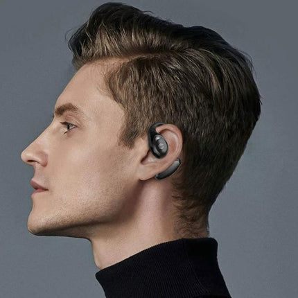 Ear Hook Wireless Earphones With Secure Fit For Running Commute shown on male runner wearing waterproof ear-hook earbuds