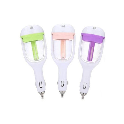 Car Negative Ion Humidifier For Aromatherapy In The Car - trio of white compact vehicle humidifiers with green, pink, and purple accents