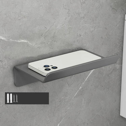 Practical Bathroom Shelf for Daily Paper and Phone Storage mounted on wall holding a phone and a roll