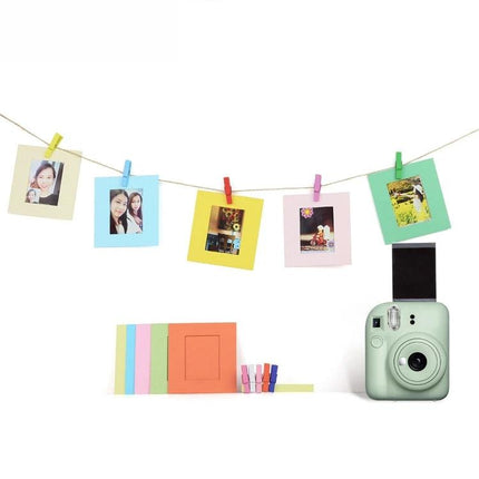 Polaroid Mini12 Camera Bag with Photo Album and Accessories in Multiple Colors shown with instant prints and mint Polaroid Mini12