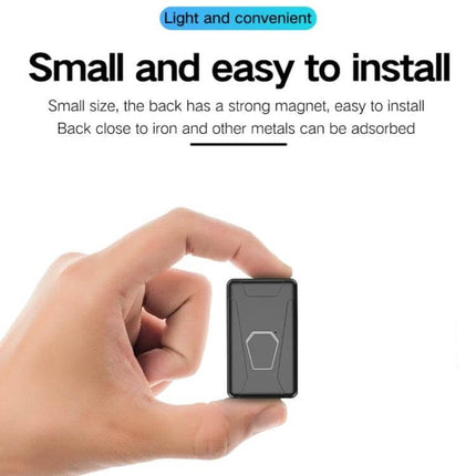 Hand holding compact Waterproof GPS Tracker for Vehicle and Personal Safety showing small, easy-to-install magnetic design