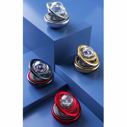 Interstellar Vast Solar Car Aromatherapy Ornaments Black anodized metal solar car diffuser shown in black among red, gold, silver variants on blue display