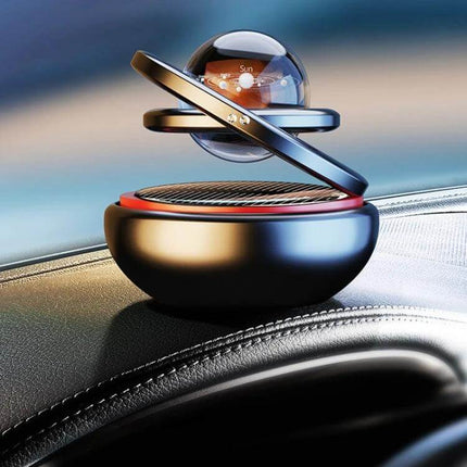 Interstellar Vast Solar Car Aromatherapy Ornaments Black anodized metal solar-powered car diffuser on dashboard
