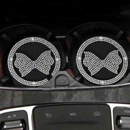 Car Multifunctional Anti Slip Coaster With Diamond Bow Crystal placed in car cup holders, black non-slip PVC with sparkling crystal bow design