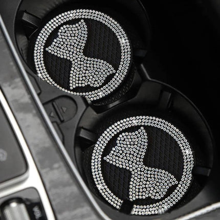 Car Multifunctional Anti Slip Coaster With Diamond Bow Crystal placed in car cup holders, rhinestone bow design, non-slip PVC, protects against spills and scratches