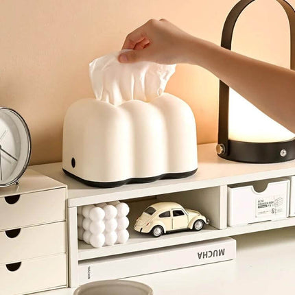 Cloud Tissue Box Holder Cream For Tabletop Or Wall Mount – cream cloud-shaped PP tissue box on desk with hand pulling a tissue