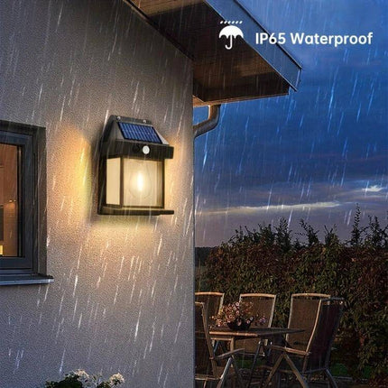 Solar Outdoor Tungsten Wall Light For Garden, Three Mode, Weatherproof mounted on exterior wall glowing in rain with solar panel and motion sensor