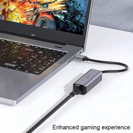 JINGHUA Gigabit LAN Converter for Computer Network Connections connected to a laptop via USB-C for stable gaming and streaming