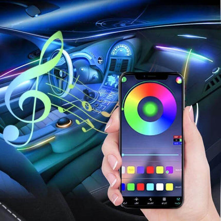 Car Interior RGB Fiber Optic Ambient Lamp Footwell 110cm installed in car footwell with smartphone RGB color wheel control and music-synced lighting