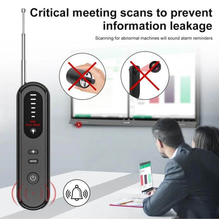 Handheld Wireless Detector for Hidden Cameras and GPS Devices scanning a conference room for hidden cameras and GPS devices