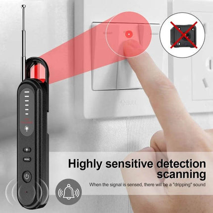 Handheld Wireless Detector for Hidden Cameras and GPS Devices scanning wall outlet and detecting hidden camera lens