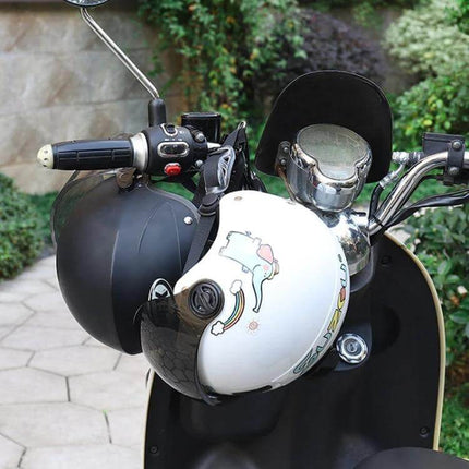 Motorcycle Helmet Anti Theft Lock Padlock For Secure Parking Black secured to scooter handlebars with two helmets hanging