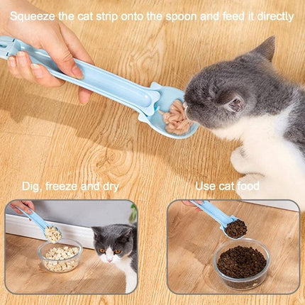 Spoon for Everyday Cat Feeding and Snack Giving at Home - blue feeding spoon measuring treats while kitten eats
