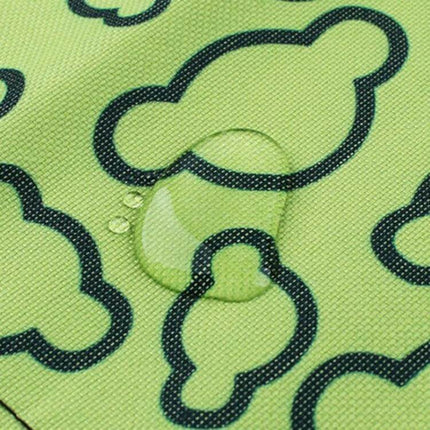 Car Seat Waterproof Pet Pad For Cars Protects Seats - close-up of waterproof polyester fabric with water droplets on green paw print pattern