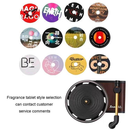 Rotating Retro Gramophone Car Aroma Diffuser for Air Vent showing vinyl-style fragrance discs and clip-on vent unit