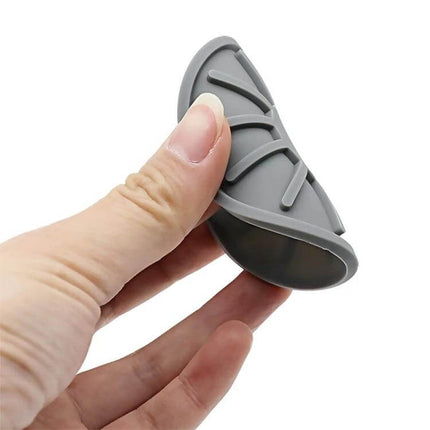 Car Cup Holder Coasters Set of 4 Silicone 6.8x0.3 cm — gray silicone coaster held and flexed to show durability and non-slip ribs