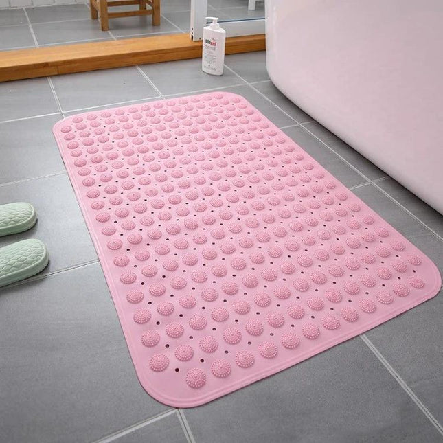 Pink textured mat next to tub - Essential Bathroom Mat for Everyday Home Wet Area Use to catch drips and prevent slips