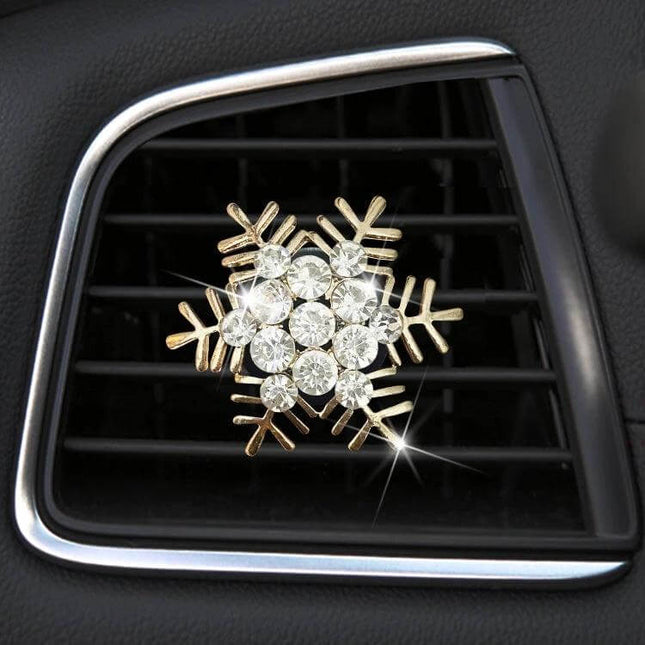 Rhinestone Snowflake Metal Car Vent Clip For Aromatherapy attached to car air vent with sparkling crystals, metal body and secure clip for aromatherapy