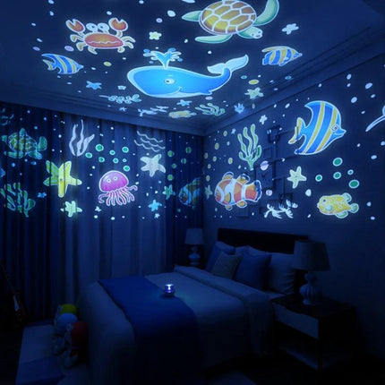 Create a Cozy Home Atmosphere with Cartoon Projection Night Light projecting colorful ocean animals on bedroom walls and ceiling for a soothing bedtime scene