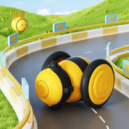 Toy for Engaging Cats with Bee Design in Home Playtime - yellow bee-shaped interactive rolling cat toy on a toy road to stimulate indoor play