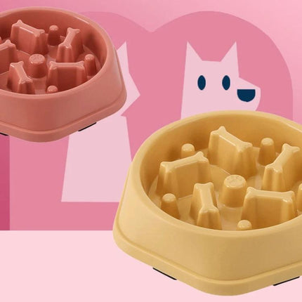 Essential Bone-Shaped Bowl for Daily Dog Meals at Home - slow-feed PP bone-shaped dog bowl in pink and yellow for everyday meals