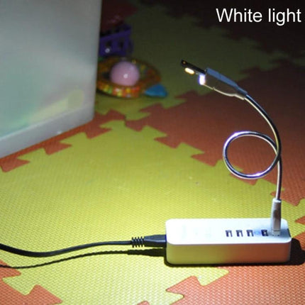 Compact USB Light for Emergency Use During Travel and Home showing flexible gooseneck LED plugged into USB hub illuminating floor mat