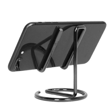 Versatile Desktop Stand for Phones, Tablets and Business Cards showing black alloy phone holder on desk, adjustable viewing angle and cable access