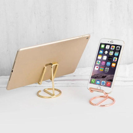 Versatile Desktop Stand for Phones, Tablets and Business Cards displaying gold tablet and rose-gold phone on a desk, durable alloy electroplated design